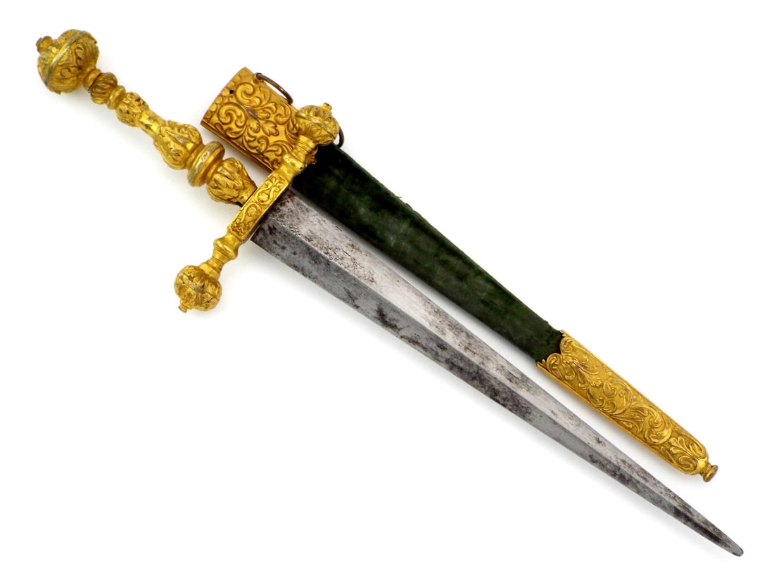 European Victorian Revival Dagger in Style of Renaissance with GILDED BRASS RELIEF: Stiff, diamond section tapering thrusting blade displays extensive oxidation, dark spotting and surface graying throughout. Finely cast gilded brass hilt features a multi lobed pommel and matching str