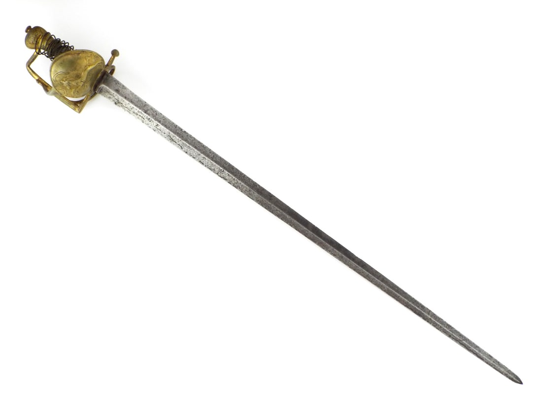Interesting German 18th C. House of Hanover Officer Sword with GILT BRASS SAXON STEED: Stiff straight thrusting blade showing generalized spotting and a dark grey patina with a central fuller. Gilt brass hilt features an oval shell guard chased with the prancing Hanoverian horse, a D-sh