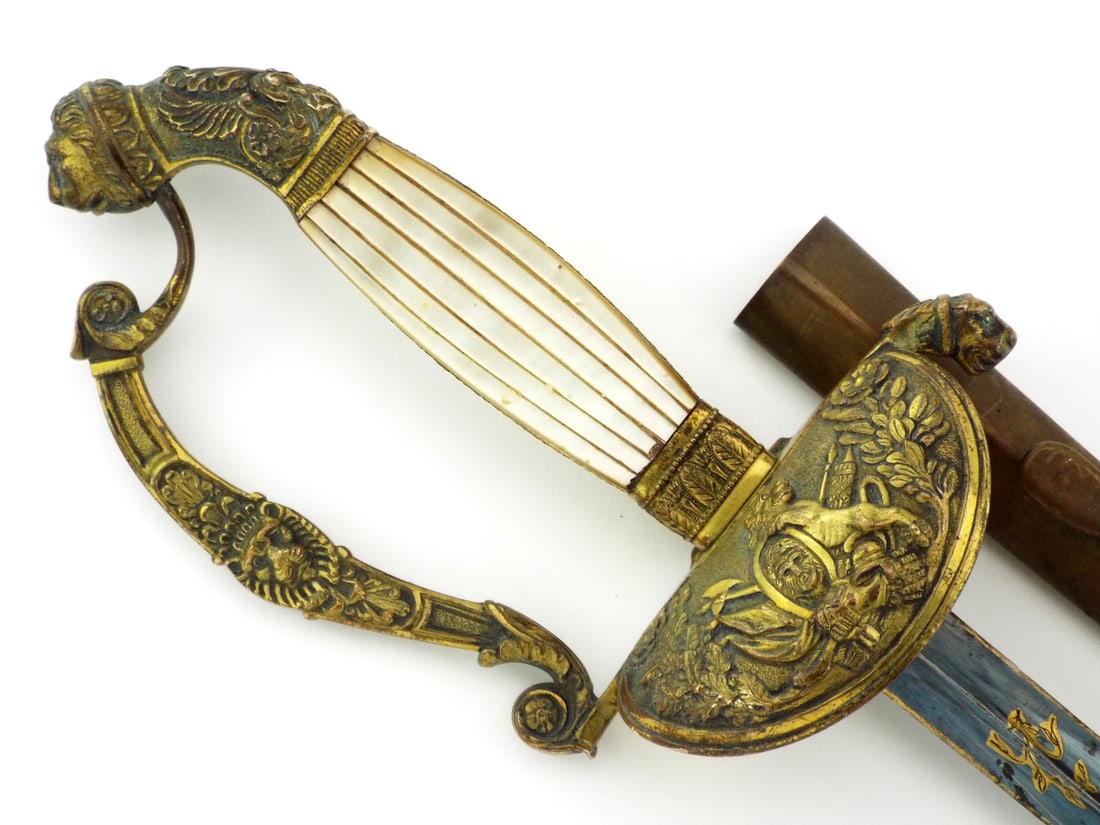 Belgian Early Constitutional Kingdom Court Sword with MOP Hilt: Straight, triangular section blade exhibits vibrant blueing and gold gilding with floral panels, showing light surface oxidation and a sharp crescent maker mark near the ricasso. Brass hilt retains co