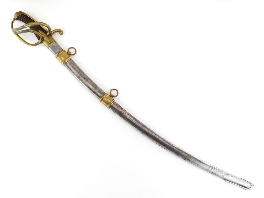 Nice French Napoleonic Cavalry Officer Sword with GILDED MARKINGS: Fine steel blade features distinct watering marks, scattered grey oxidation and gilded etchings of crossed lances, a star and a crescent moon. Brass three branch guard and langets display a mellow pat