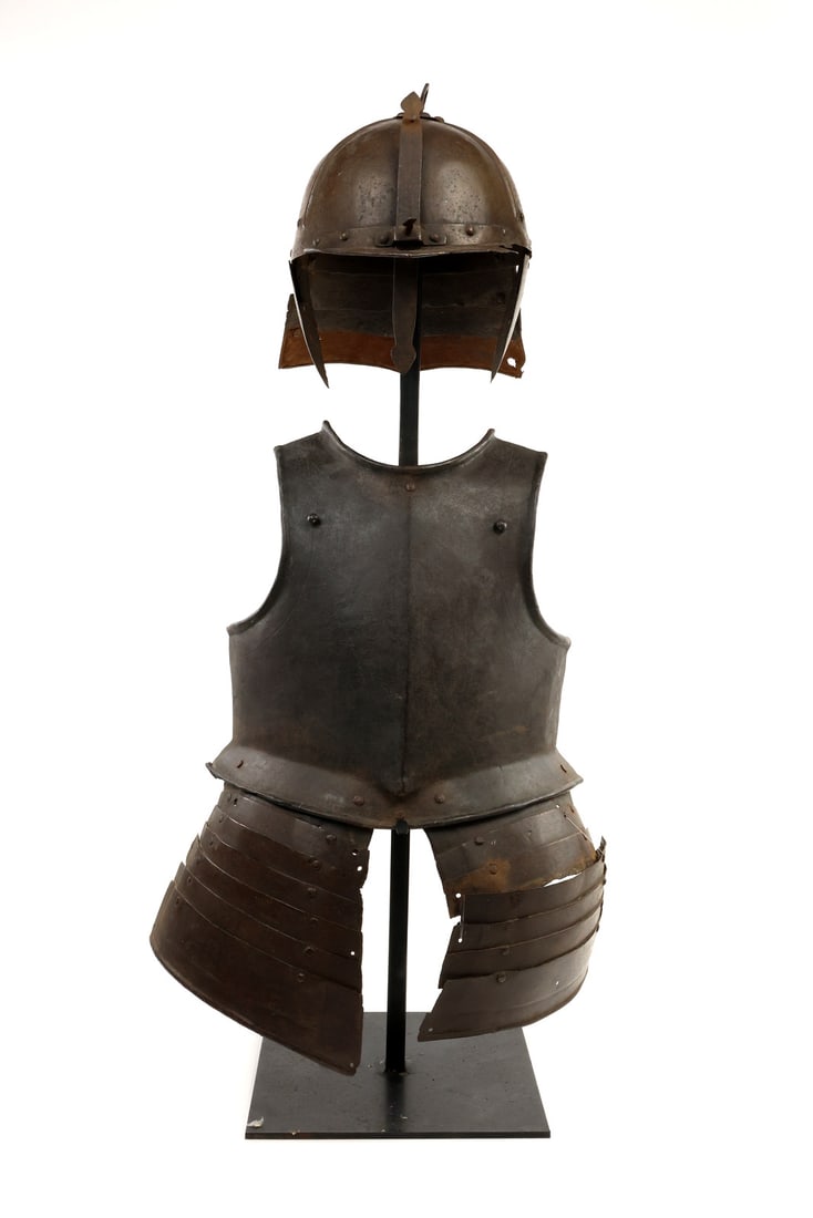 European Antique Cavalry Armor with Lobster Tail Pot Helmet & Matching Tassets: Armor elements comprising a heavy munitions grade breastplate with distinct medial ridge, flared flange and matching backplate showing expected deep oxidation, surface scuffs and darkening. Two attach