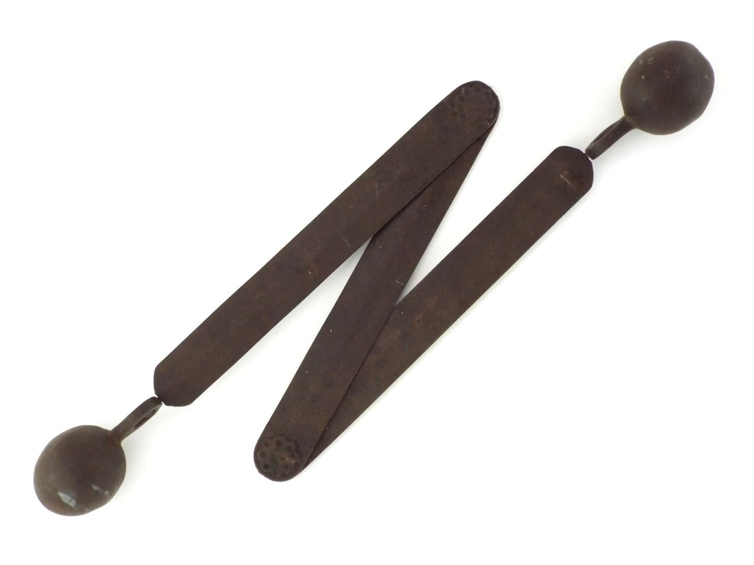 Asian 19th C. CHAIN SHOT CANNON BALL: Triple section articulated wrought iron straps displaying heavy russet oxidation throughout. Three hinged joints retain functional movement, featuring decorative circular floral stamps at pivot points