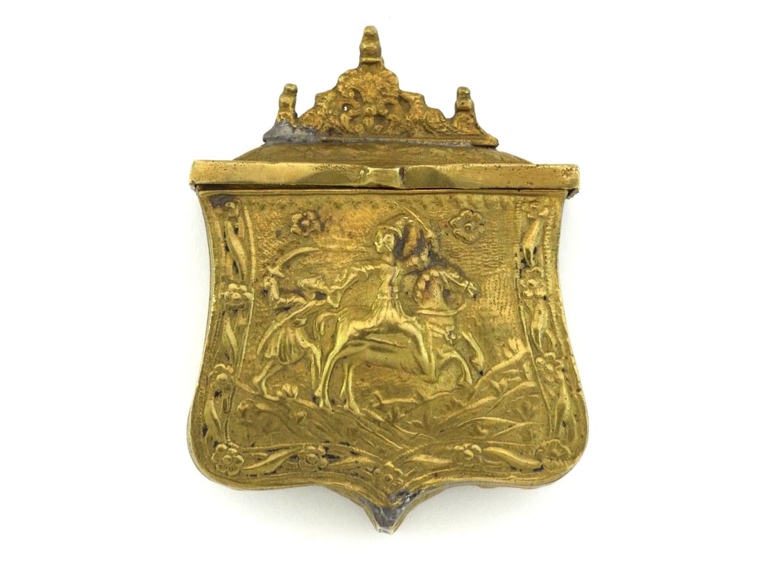 Ottoman 19th C. AMMUNITION PALASKA POUCH Cast Brass WARRIORS RELIEF: Cast brass ammunition pouch featuring a heavy relief hunt scene of a mounted horseman and foot soldier within a floral border. The body shows age related wear and expected oxidation to the recesses. T