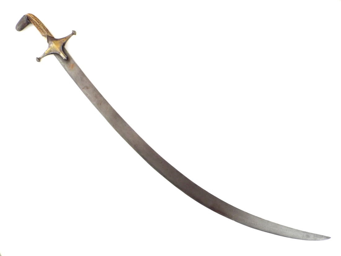 Indo-Persian Shamshir Sword with WOOTZ BLADE & GOLD ISLAMIC CARTOUCHE: This fine sword features a deeply curved crucible steel blade displaying a fine, high contrast grain throughout with scattered light oxidation. The forte with a gold inlaid floral cartouche showing mo