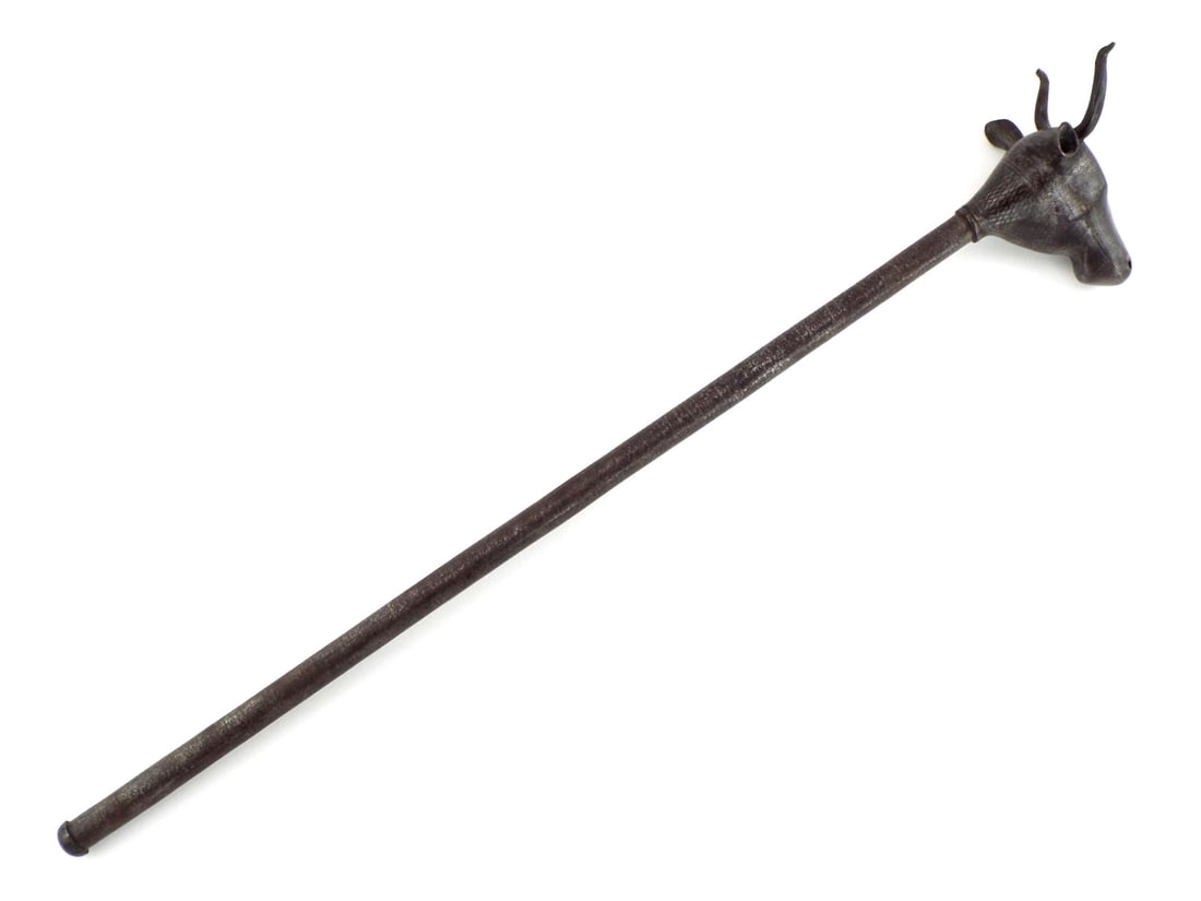 Fine Indo-Persian Bull Head Mace DAMASCUS PATTERN HAFT & Etched Scrollwork: Fine cast iron bull head displays characteristic hollowed ears and curved horns with expected surface oxidation. Head features remnants of gold koftgari and etched foliate motifs. The steel haft