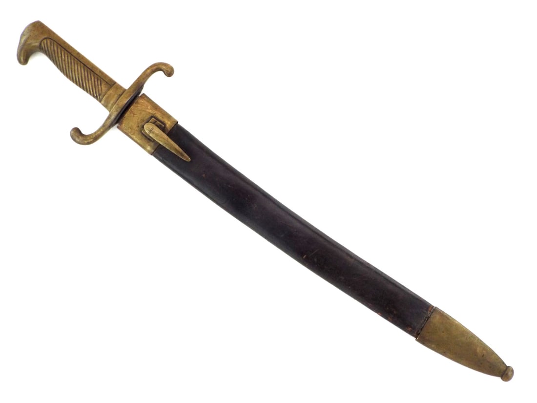 Prussian M1864 Fascine Knife By SCHNITZLER & KIRSCHBAUM with Unit Marked Brass Hilt: Slightly curved single edged steel blade shows dark oxidation and age toning. Solid brass hilt features rib gripped handle and S-shaped crossguard bearing crossed out regimental stampings for the 154t