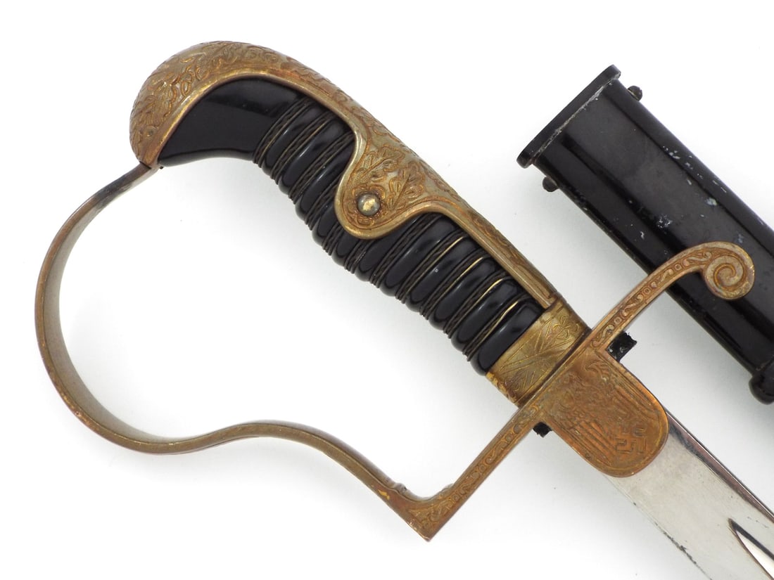 German WWII Army Officer Dove Head Sword By EMIL VOOS SOLINGEN: Bright single edged nickeled blade shows faint runner wear, retaining sharp Emil Voos Solingen ricasso stamp. Gilded brass dove head hilt displays deep uncleaned patina and minor verdigris, featuring 