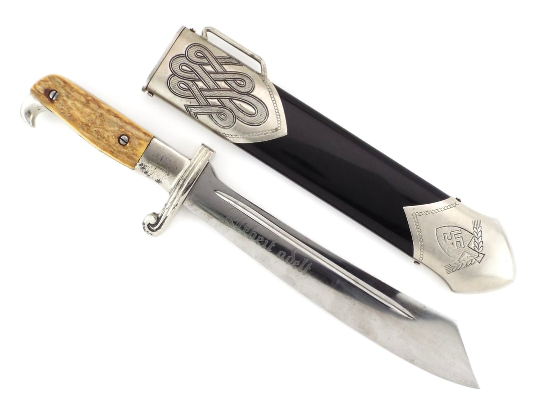 German WWII RAD Enlisted Man Hewer By GOTTLIEB HAMMESFAHR with Stag Grip: Heavy cleaver style blade exhibits superficial spotting and minor handling wear, crisply etched with Labor Ennobles motto to obverse and maker oval with design patent stamps to reverse. Nickeled hilt 