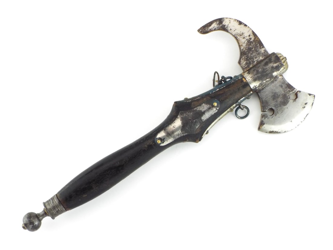 German 19th C. Dress Parade Axe with COUPLING SPANNER NOTCHES & Fluted Finial: Crescent blade features functional spanner notches displaying localized age darkening and surface oxidation, paired with a sharply down curved fluke with top retaining gilding remnants. The turned ebo