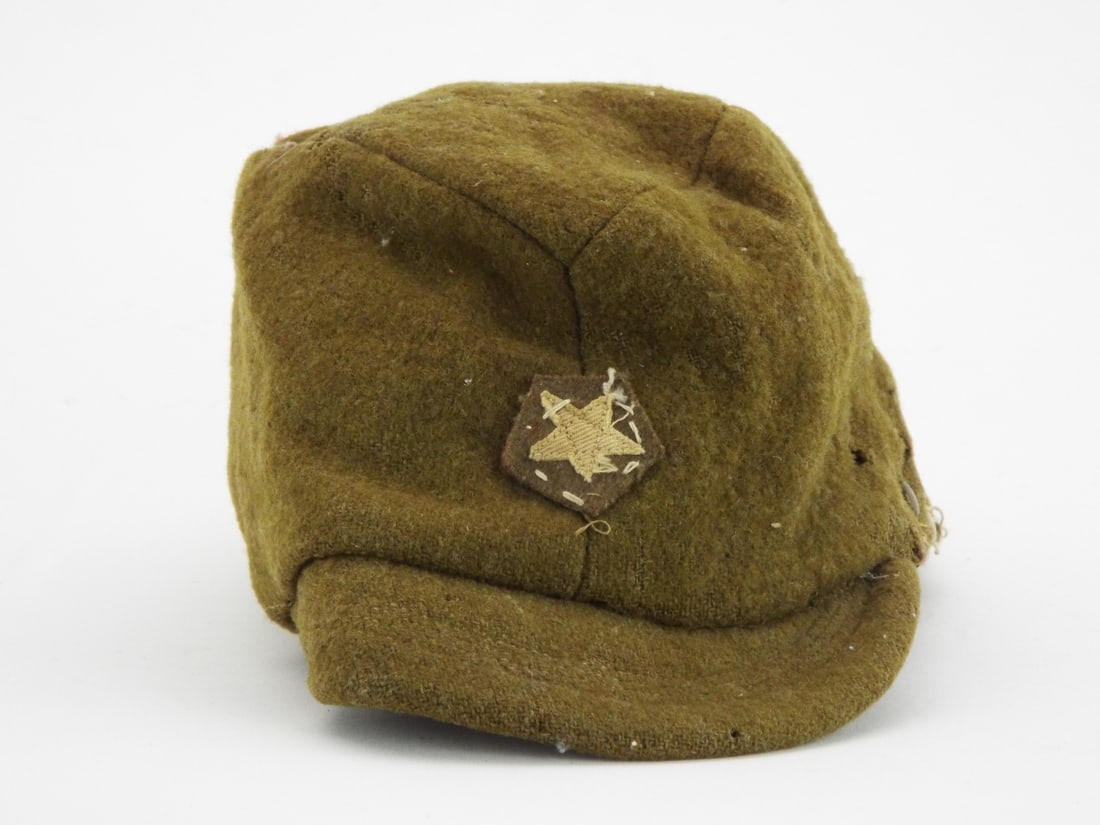 Japanese WWII Enlisted Man Wool FIELD CAP: Imperial Japanese Army enlisted man wool field cap exhibiting heavy field wear, moth damage and structural degradation to the rear crown seam. Olive green body retains its stitched pentagonal cloth fr
