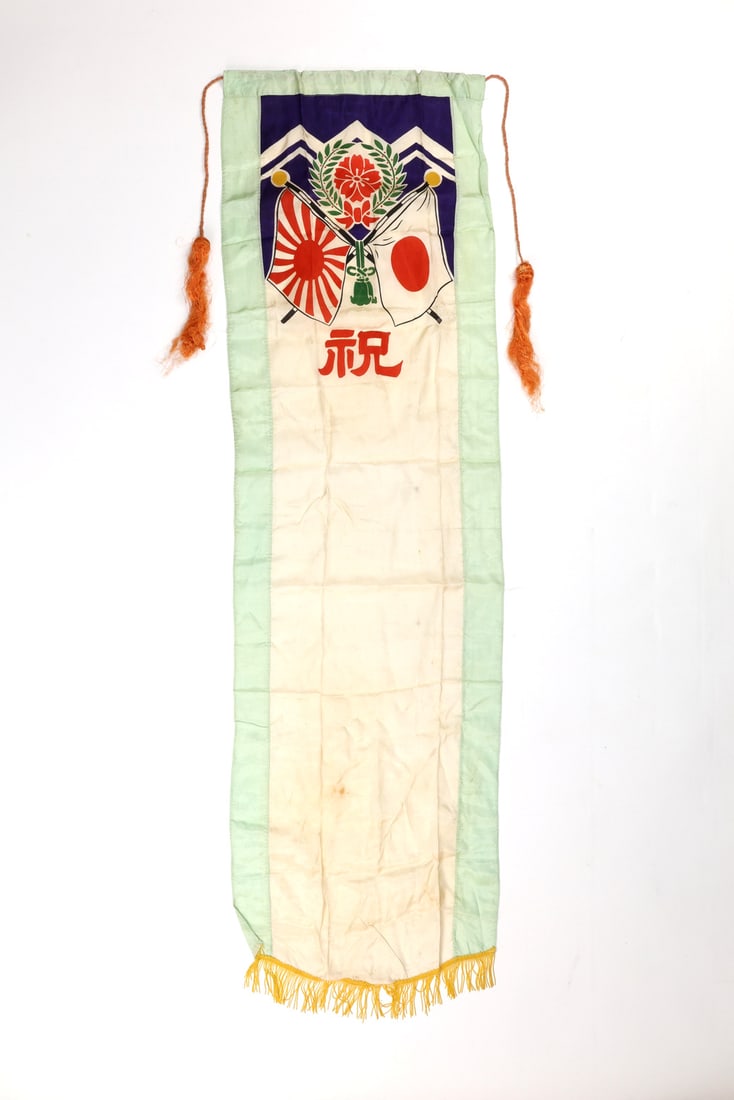 Japanese WWII SOLDIER SEND OFF BANNER Silk & Gold Fringe: Machine sewn silk body displays vibrant printed iconography including national and army flags with a large celebratory inscription. Lower part displays intact gold bullion fringe. Some light staining 