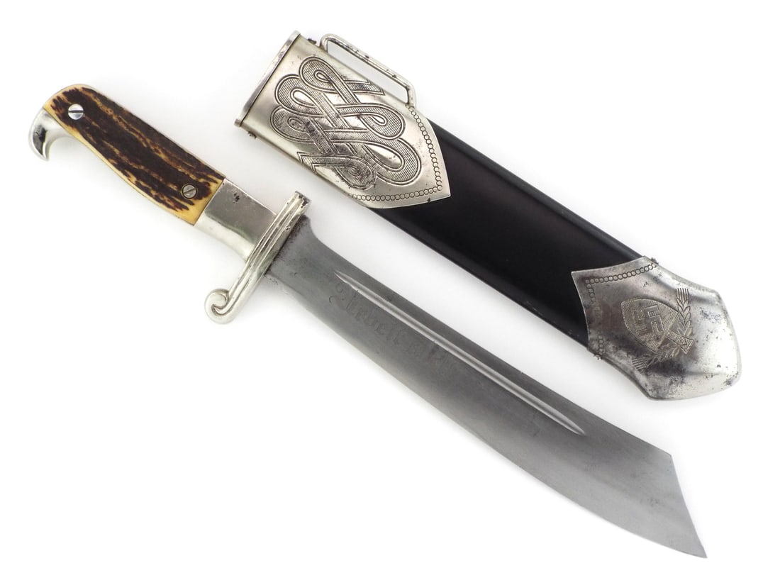 Rare German WWII RAD Leader Dagger By RICHARD ABR. HERDER with Stag Horn Grips: Single edged clip point blade displays a clean factory polish with crisp Labor Ennobles motto etching and standard manufacturer ricasso marks. The hilt retains solid nickeled fittings exhibiting minor