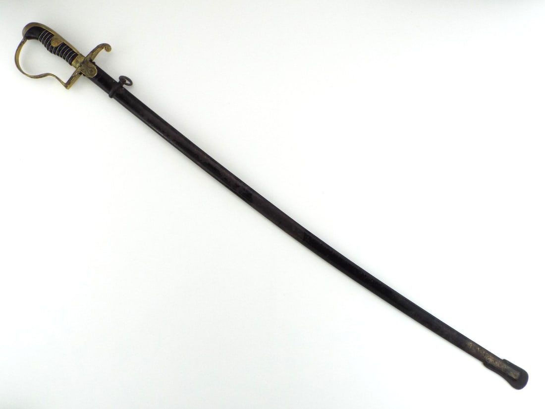 German WWII Army Officer Sword with GILT BRASS OAK LEAF RELIEF: Slightly curved single edged nickeled steel blade with fuller displays clean surface with light runner marks. Gilded brass dove head hilt showcases crisp oak leaf reliefs, Wehrmacht eagle langet and i