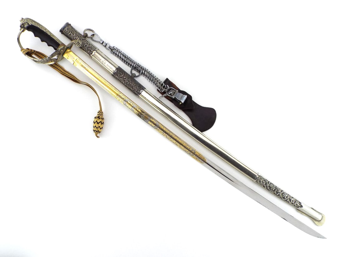 Presentation Grade U.S. Late 19th C. National Guard ID'd OFFICER SWORD: Gold etched blade displays E Pluribus Unum eagle and US motifs in remarkable condition, showing crisp frost finish with minimal tarnish, a laurel chased spine and Solingen proof mark. Multi branch bra