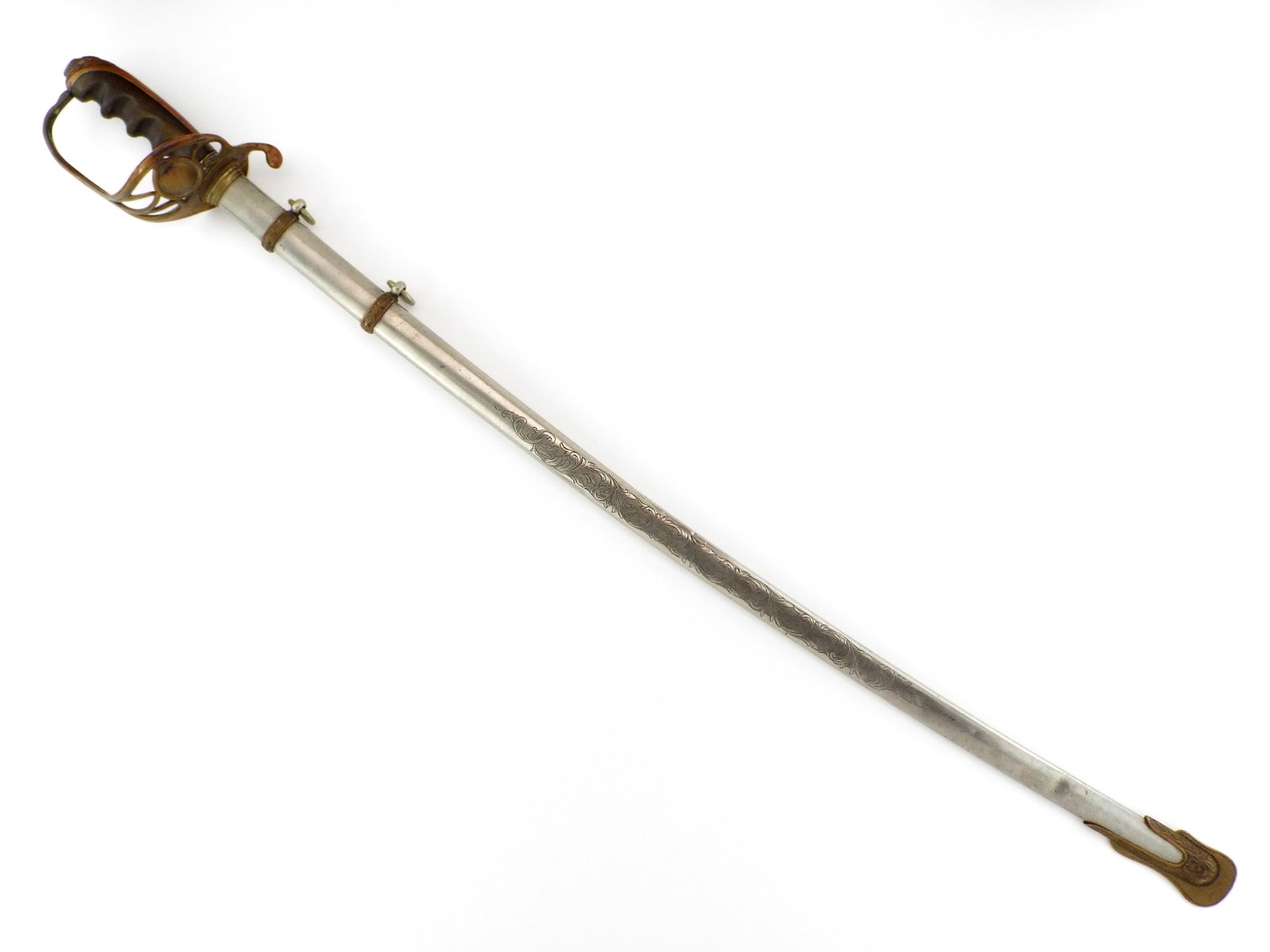 Presentation Grade US WWI M1902 General Staff Officer Sword Rare Engraved Scabbard: Slightly curved single edged blade features crisp engraved eagle, patriotic panoplies and US monogram with Wm. Reed & Sons Boston Mass retailer mark showing honest graying and light peppering. The bra