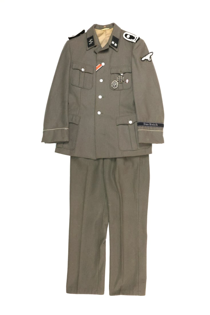 Post WWII German Made Waffen SS Officer Uniform Set 2ND PANZER DIVISION: Field tunic and matching trousers with interior stamps reading MADE IN EAST GERMANY and size marking sg 48. Tunic features rank collar tabs, shoulder boards, sleeve eagle, cuff title, Iron Cross 1st a