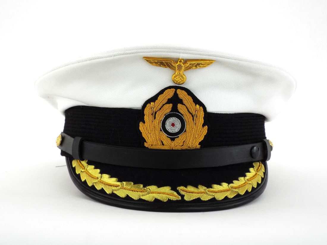Very Good Quality German Made POST WWII Kriegsmarine U-Boat Captain Visor Cap: High quality production featuring white wool top and black mohair band. Gold bullion oak leaf embroidery to visor and wreath exhibits crisp detail. Interior displays Erel Stirnschutz patent markings a