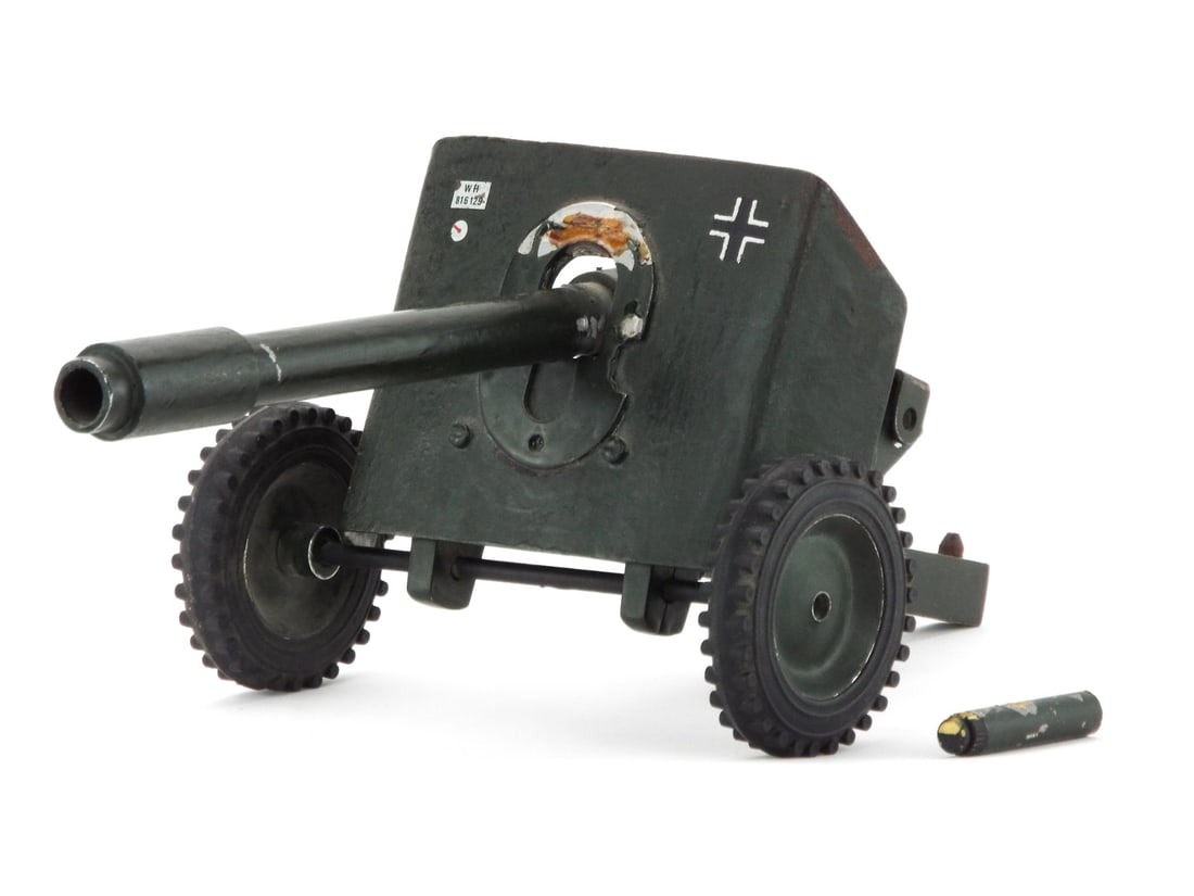 German Pre WWII PaK 36 Anti Tank Toy Gun By HAUSSER ELASTOLIN with Rubber Tires: Die cast metal body retains significant olive green painted finish with moderate flaking, showing the Balkenkreuz shield decal and stamped Wehrmacht Heer license plate number 816129. Companion metal s