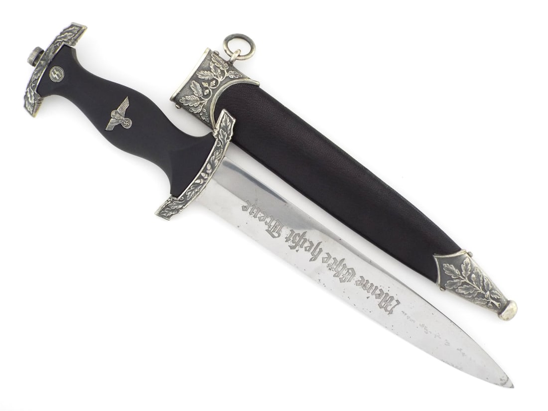 Dagger In Style of German WWII E & F HORSTER SS Himmler Dedication Blade: Double edged polished steel blade exhibits deep acid etched My Honor is Loyalty motto obverse, facsimile Heinrich Himmler dedication reverse beside RZM M7/36 contract stamp, showing minimal wear. Blac