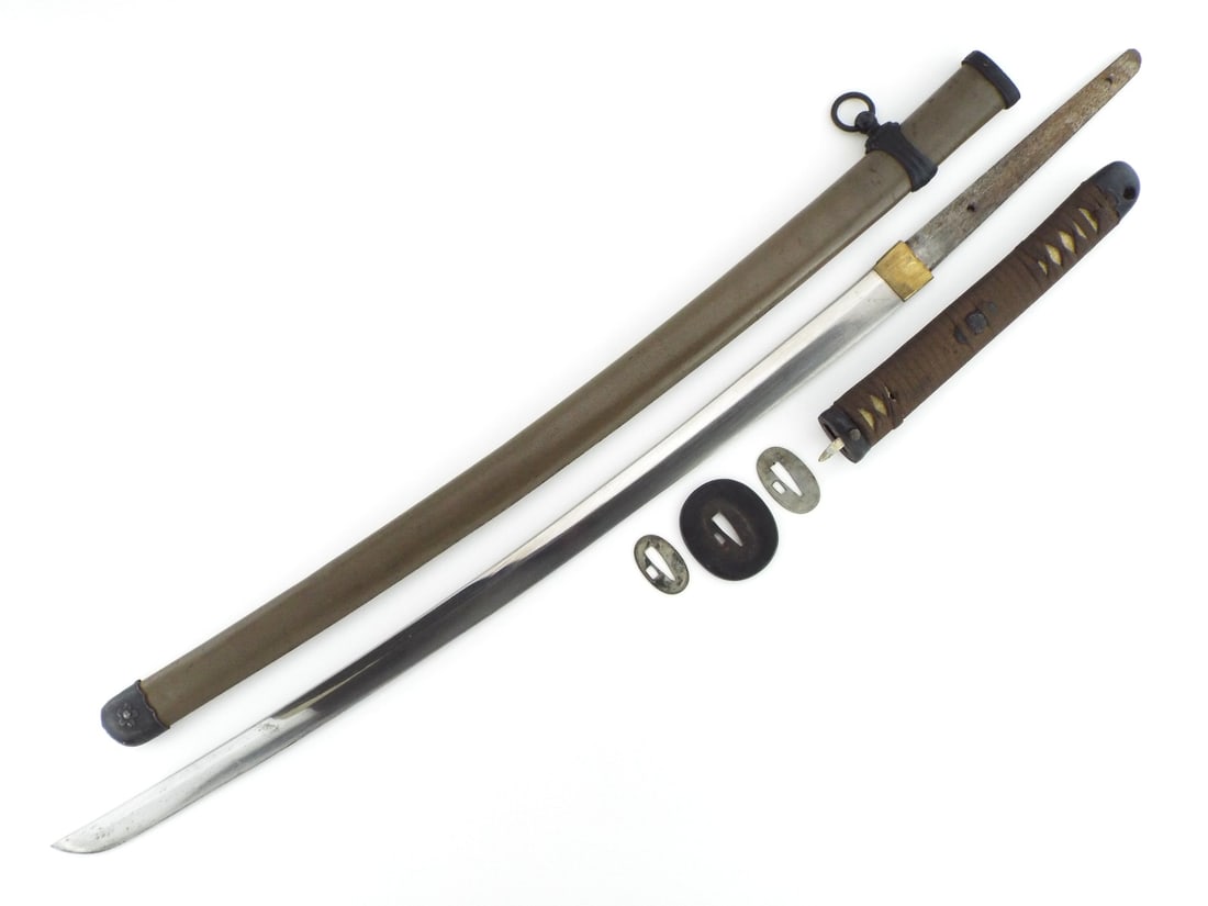 Japanese WWII Army Officer Special NAVAL LANDING FORCES SWORD: Blade exhibits light surface darkening and a visible temper line, signed Mitsuhiro and dated Showa 19 1944 on the tang under light surface. Traditional cord wrapped hilt shows age toning over shagreen