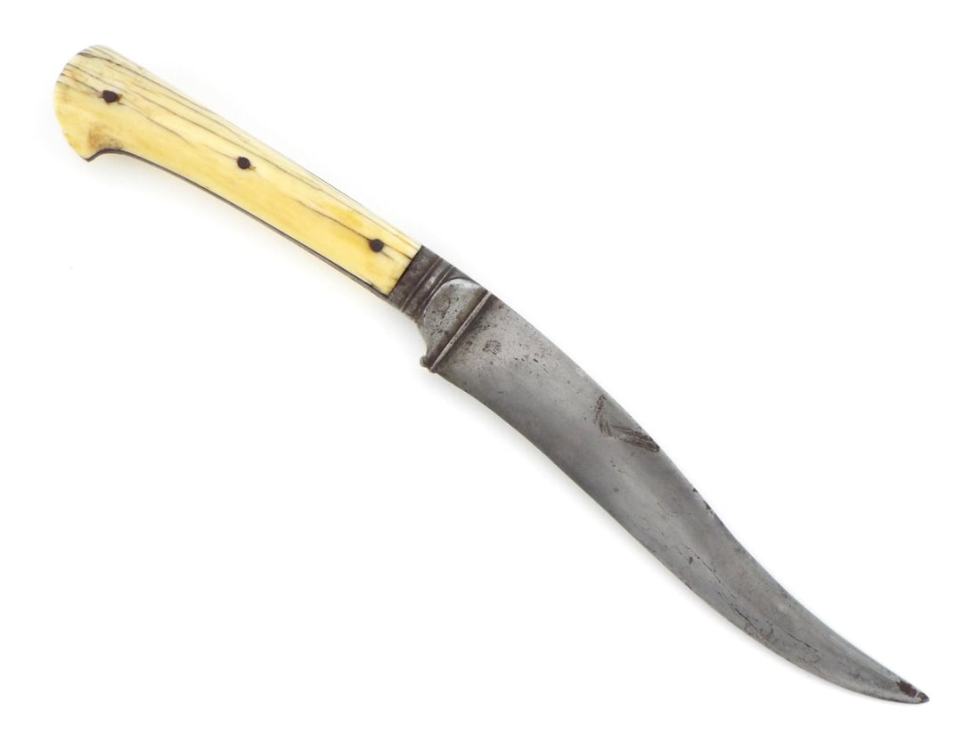 Indo Persian 18th-19th C. Dagger with BONE HILT: Recurved steel blade displays dark patina, light surface graying and file markings along the spine. Iron bolster and collar junction remain solid with minor surface wear. Full tang features aged bone 