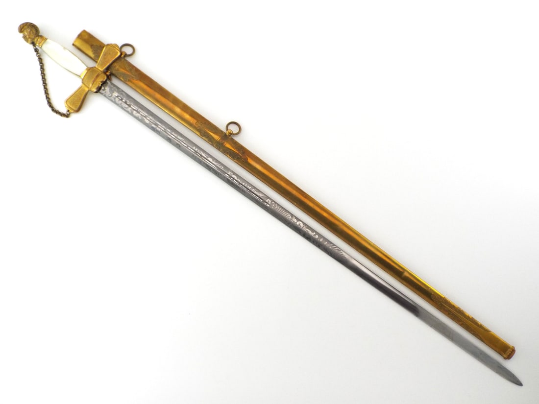 Mint Pre American Civil War MILITIA OFFICER SWORD by AMES MFG CO with MOP Grips: Superb straight blade exhibits near full frosting with crisp engraved patriotic panoply of arms, eagle and stars above the Chicopee address. Gilt brass hilt remains solid featuring a detailed knight h