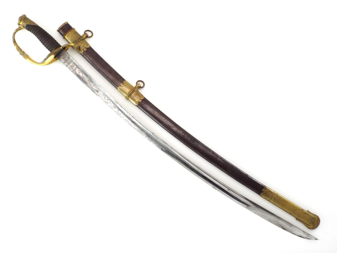 Superb US Civil War Officer Sword Horstmann & Sons Etched Gilt Brass: Excellent blade featuring military trophies and sprawling floral volutes across its mirror polished surface, complemented by a decorative laurel leaf motif along the spine. The hilt is defined by a pi
