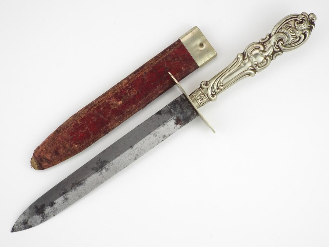 Very Nice US Civil War Sheffield Bowie Dagger SILVER MOUNTED & Etched Blade: Sheffield Bowie dagger features a double edged crucible steel blade with raised central ridge, acid etched foliate scrolls and maker mark MASON SHEFFIELD at ricasso. Surfaces show grey patina and hone