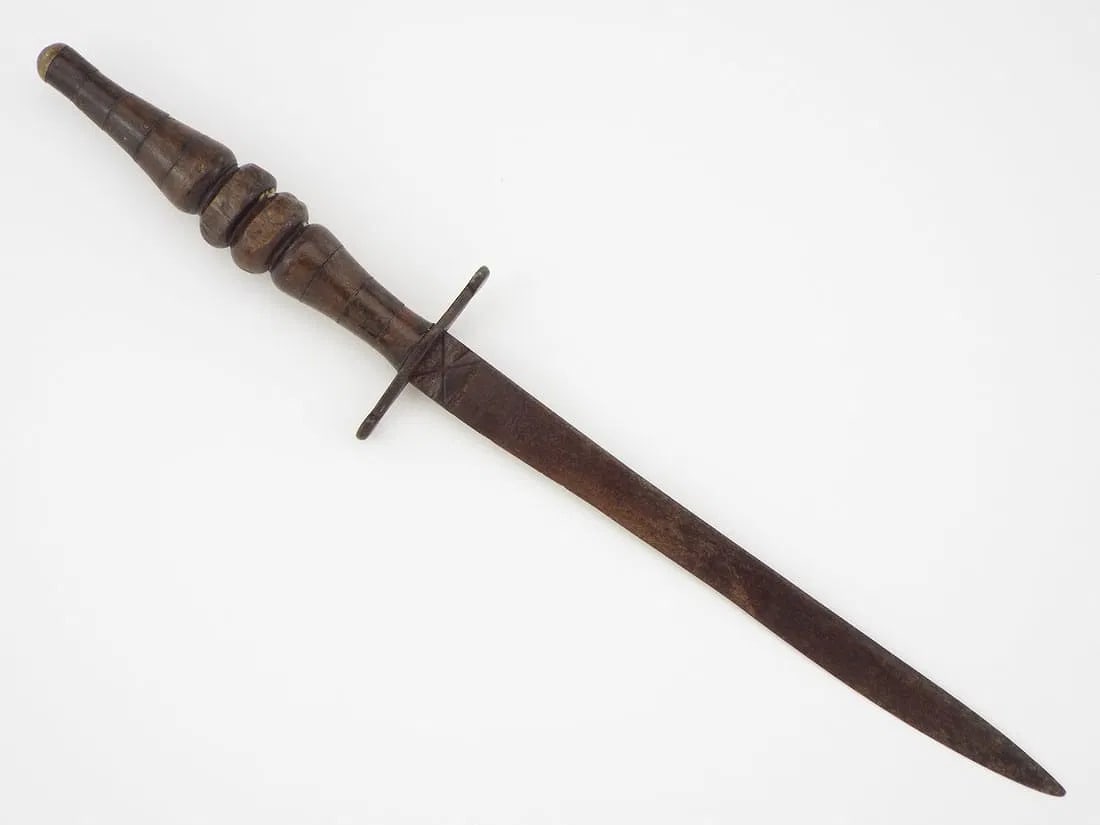 Hard To Come By Rare US Civil War PISTOL PLUG BAYONET DAGGER: Tapering thrusting blade exhibits dark, untouched surface rust with light age wear and incised crosshatching at the ricasso. Carved hardwood grip features turned ring moldings displaying minor surface
