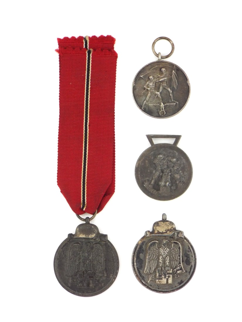 Lot of 4 German WWII Italian & Eastern Fronts Medals: Four medals comprising Italian German Campaign in Africa Medal, Austrian Annexation Commemorative Medal and two Eastern Front Medals. Struck bronze and zinc bodies show minor edge knocks, light surfac