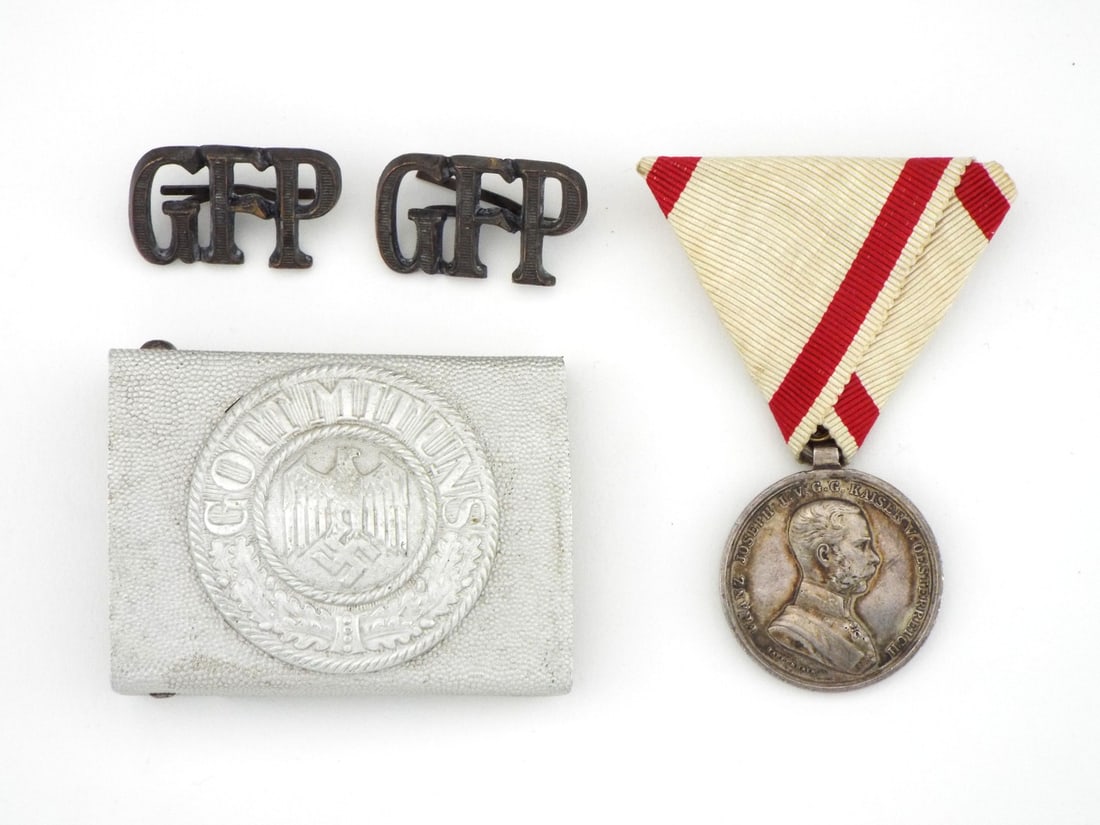 German & Austro-Hungarian WWI-WWII Group GFP CYPHERS & Silver Medal: Austro-Hungarian Medal for Bravery features silver construction, crisp profile relief and moderate surface wear with rich toning. Triangular ribbon exhibits light soil and fraying. Pair of Secret Fiel