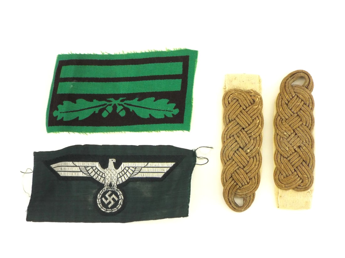 Group of German WWII WEHRMACHT Field Officer Rank Insignia: Group of field grade officer braided shoulder boards displaying light handling wear and minor toning to the silver cordage, mounted on intact cloth bases with solid stitching. Machine embroidered silv