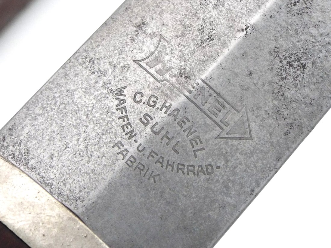 RARE MAKER German WWII Early SA Dagger By C.G. HAENEL SUHL: Early production Sturmabteilung service dagger featuring a blade etched with the traditional German motto, exhibiting overall runner marks and speckling, alongside a distinct maker trademark on the ri
