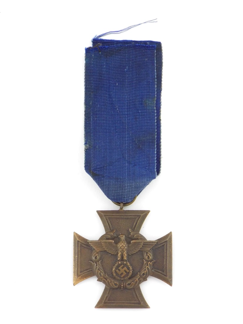 German WWII Customs Border Protection CROSS MEDAL with Blue Ribbon: Bronze service cross medal exhibits crisp stippled arm fields surrounding a central eagle and wreathed symbol. Reverse features a raised oak leaf wreath encircling the translated inscription reading F