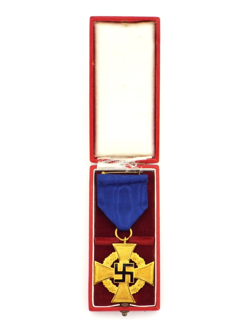 German WWII 50 Years Faithful Service Cross Medal CASED & GILT FINISH: Gilt cross body displays a black enamel central symbol, surrounded by a frosted oak leaf wreath with light surface wear and bright gilding. Suspended from a crisp blue ribbon attached to a pin bar. St