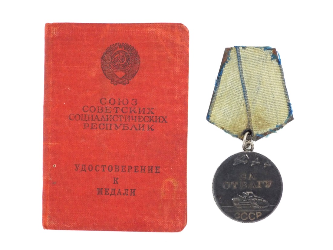 Soviet WWII Medal For Courage in Sterling Silver with Award Booklet: Standard 35mm sterling silver medal, surface shows moderate contact marks and dark toning. Reverse bears stamped serial 3532855 matching included red cloth award booklet. Pentagonal steel suspension s