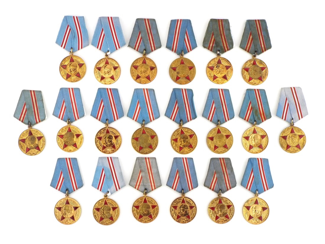 Soviet Post WWII LOT OF 20 JUBILEE MEDALS Red Enamel & Brass: Group of 20 brass medals showing uniform surface wear, light scuffing and aged patina, featuring raised profile reliefs inside red enameled star borders with reverse translating to Fifty Years of the 