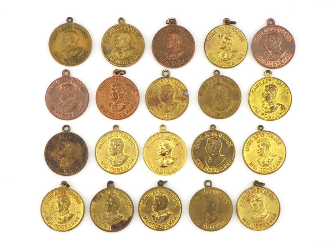 Group of 20 Soviet Post WWII Medals BRONZE & BRASS: Lot of 20 World War II Soviet campaign medals featuring raised relief profile of Joseph Stalin, obverse translating Our Cause is Just - We Have Won, reverse translating For Victory Over Germany and Fo