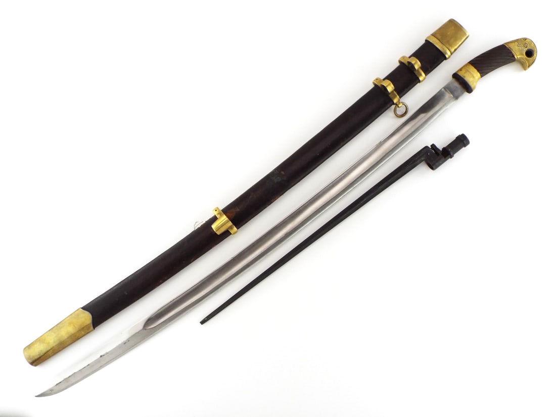 Soviet Russian WWII Officers Shashka Sword: Mint Condition Sword. Wide Bright Nickel Plated Blade. Gilded Brass Fittings Featuring Star On The Pommel And Soviet Crest With 10 Ribbons. This Is Early Production Sword C.1940. Comes With Original B