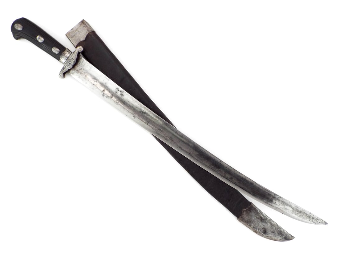 Continental 18th C. Hunting Sword BLACK HORN HANDLE: Broad, single edged curved steel blade displays a broad, shallow fuller with localized oxidation and smooth gray patina. S-shaped iron crossguard features an engraved central rosette block