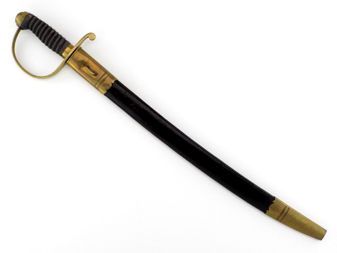 Mint British 19th C. Police Constable Short Sword By PARKER FIELD & SONS LONDON: Single edged steel blade shows a bright finish with light scuffs and a prominent fuller, equipped with a functional spring loaded scabbard locking catch at the ricasso. Brass D-guard hilt remains