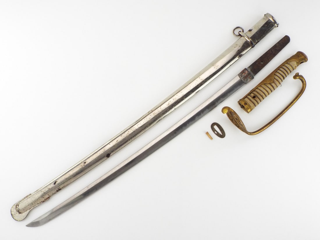 Japanese WWI to WWII Kyu Gunto Sword with Family Samurai MON: Japanese WWI to WWII Kyu Gunto Sword with Family Samurai MON Full. Length 37.5 Inches Blade Length 24 Inches. Buyer's Premium.