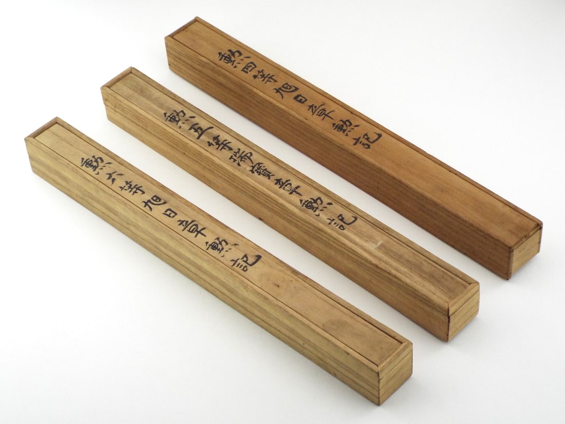 Sequential Japanese RUSSO-JAPANESE WAR OFFICER IMPERIAL DECORATIONS In Paulownia Cases: Document set comprises three Imperial Diplomas for the Order of the Rising Sun, 4th and 6th Class and the Order of the Sacred Treasure 5th Class. Awarded to Infantry Lieutenant Maseya Fukamizu between