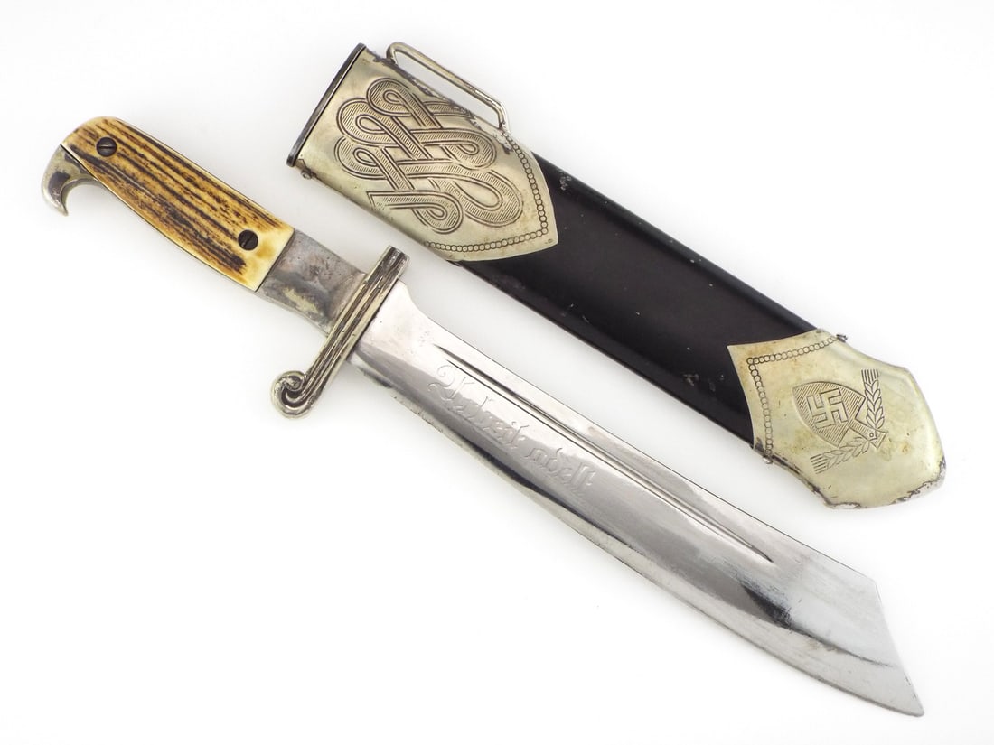 German WWII RAD Hewer By ED. WUSTHOF Solingen & MATCHING SERIAL NUMBERS: Single edged, cleaver style blade exhibits graying, light age spotting and a crisp, deep Labor Ennobles etching with manufacturer and issue markings on the ricasso. Pommel retains a tight, uncleaned p