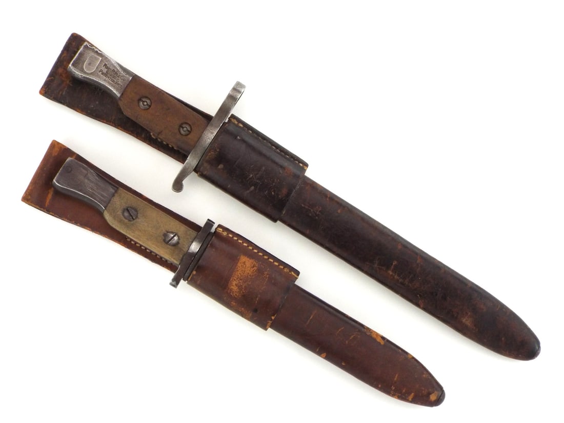 Canadian WWI Ross Mk II Bayonet & TRENCH KNIFE Pair: Matching pair features one single edge profile bayonet blade exhibiting light surface darkening alongside a period modified fighting knife from the same bayonet type, with the blade ground to a clip p