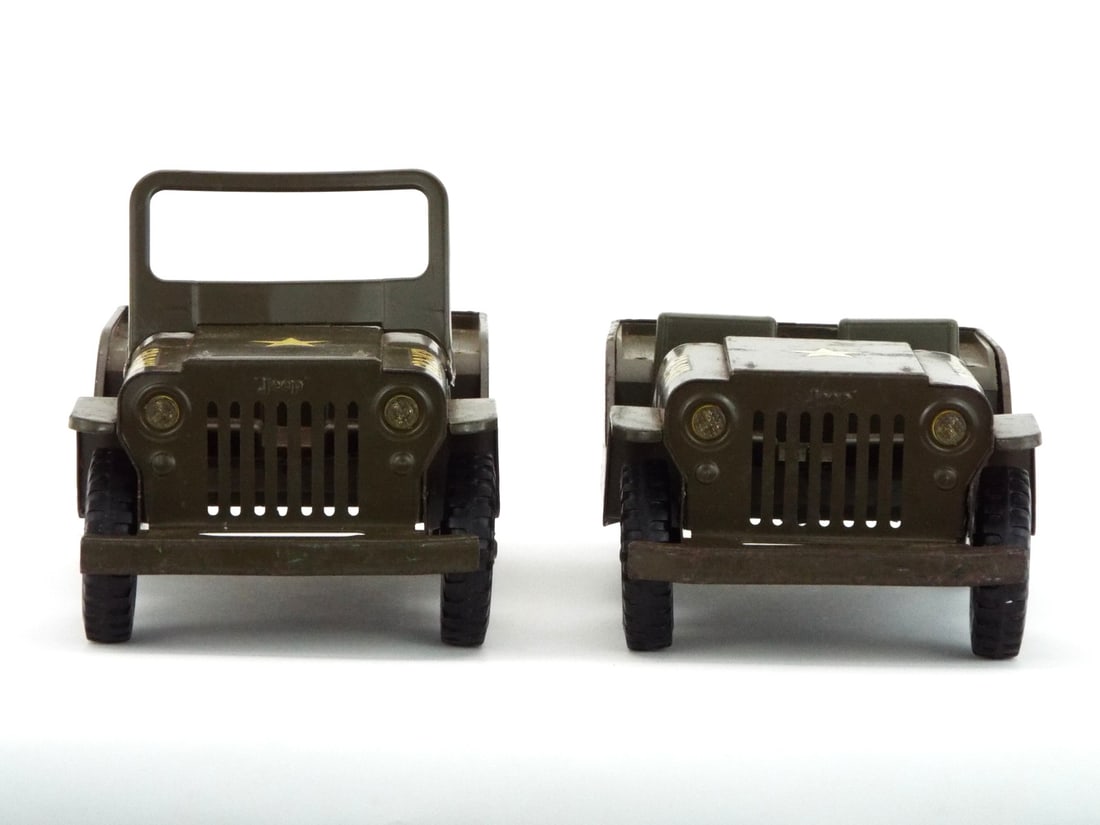 Pair of US WWII TONKA Steel US ARMY TOY JEEPS: Pressed steel bodies retain green finish with yellow star decals and hood text GR 2-2431 showing minor surface scuffs and edge wear. Plastic seat inserts and undercarriages remain intact, showcasing b