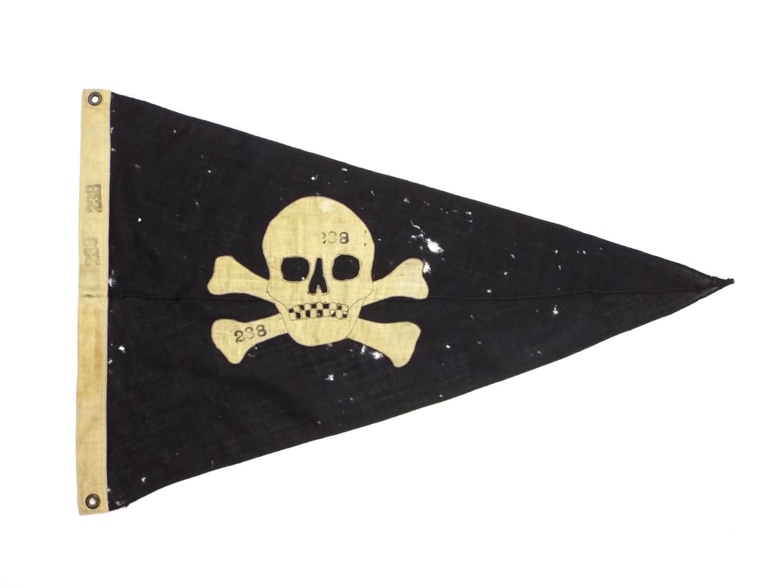 US WWII SUBMARINE Battle Flag USS WAHOO SS-238 Pennant: Triangular black bunting pennant body exhibits moth tracking, scattered open holes throughout the field and a hand sewn light tan cotton linen skull and crossbones emblem displaying fine zig-zag edge 
