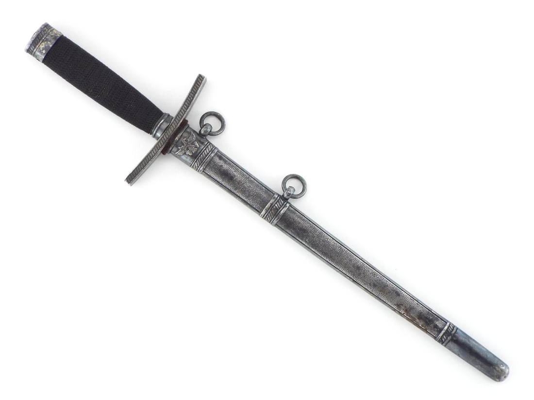 VERY GOOD Quality German POST WWII Hitler Youth Leader Dagger: Double edged steel blade features etched motto reads Blood and Honor on obverse side with dedication inscription reads For Merit in the Service of German Youth on reverse, showing mild surface wear, a