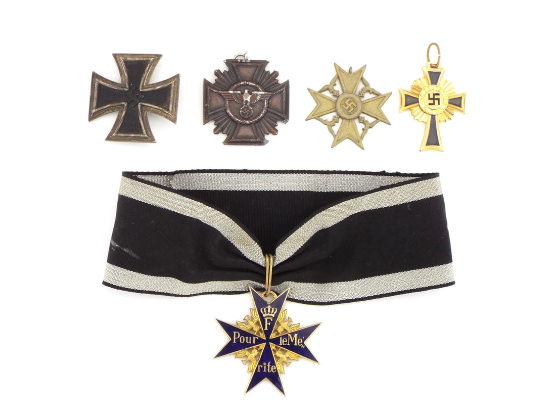 Lot of German POST WWII Medals with Neck Ribbon: Enamel, silvering and gilt finishes display varied age related wear and oxidation across an Iron Cross, Police Long Service Award, Spanish Cross, Faithful Service Award and Pour le Merite. The iron cr
