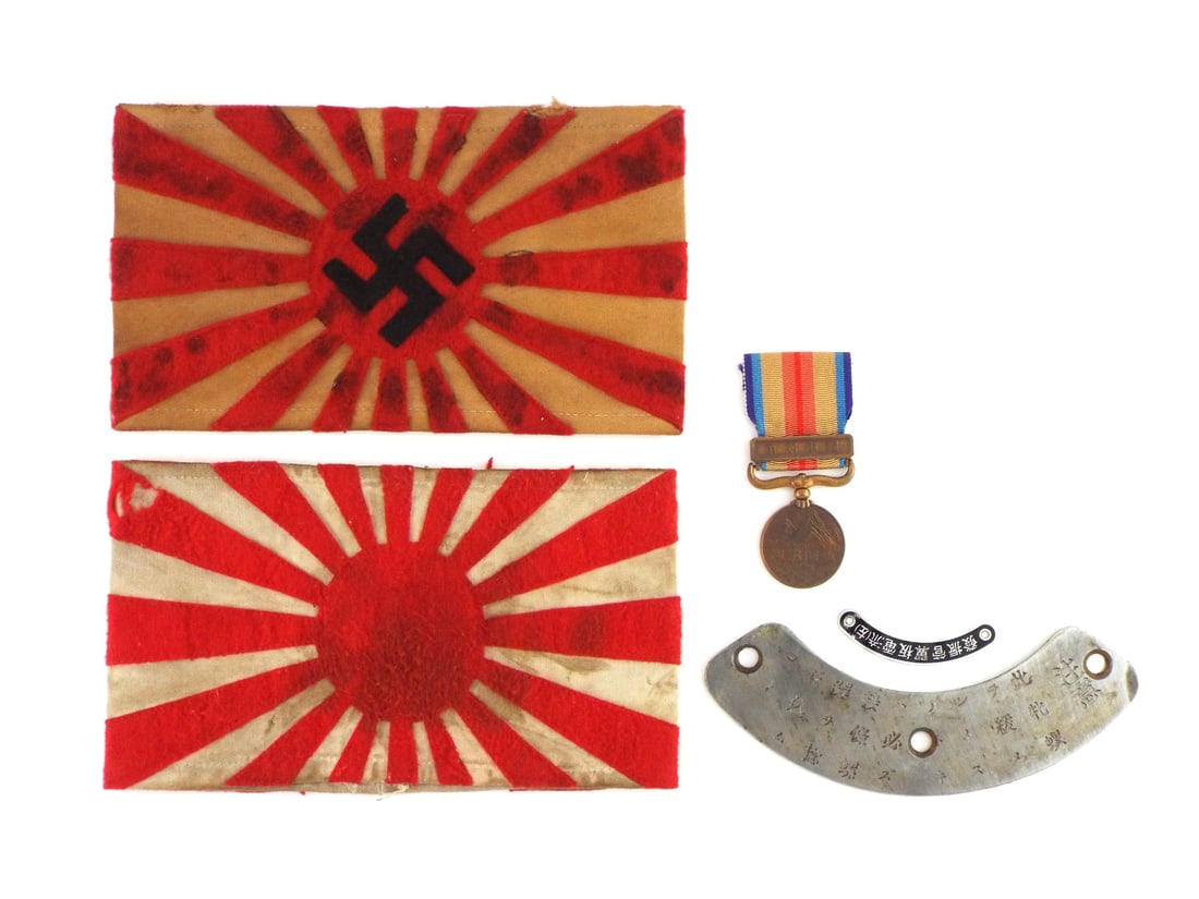 Japanese WWII Alliance Sleeve Bands Medal & AIRCRAFT PLATES: Group comprising two wool alliance armbands, a bronze campaign medal and two etched aluminum technical plates. Upper khaki wool band features a hand cut stitched felt sunburst with central hooked cros